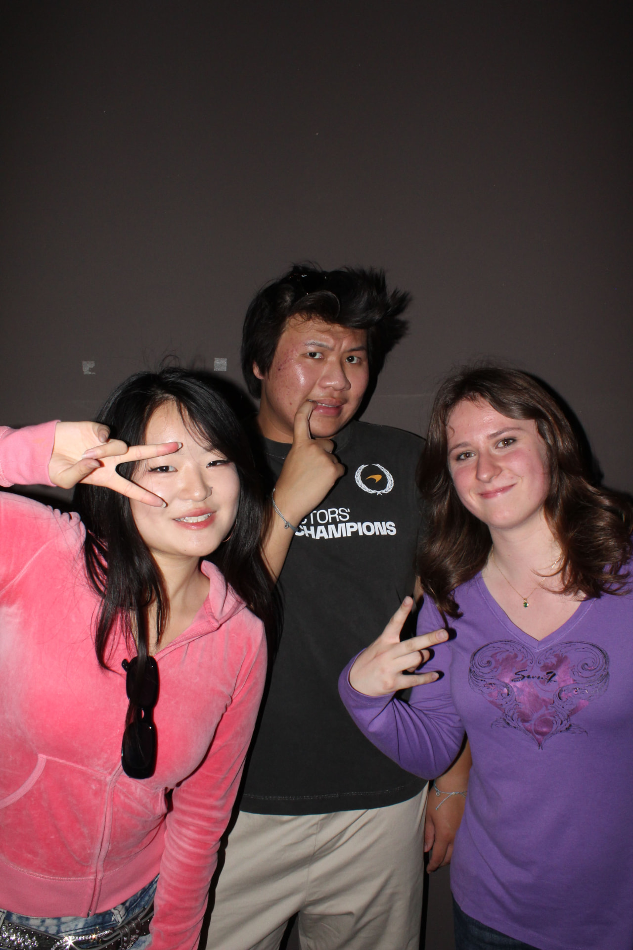 Three chapter members together at a social event