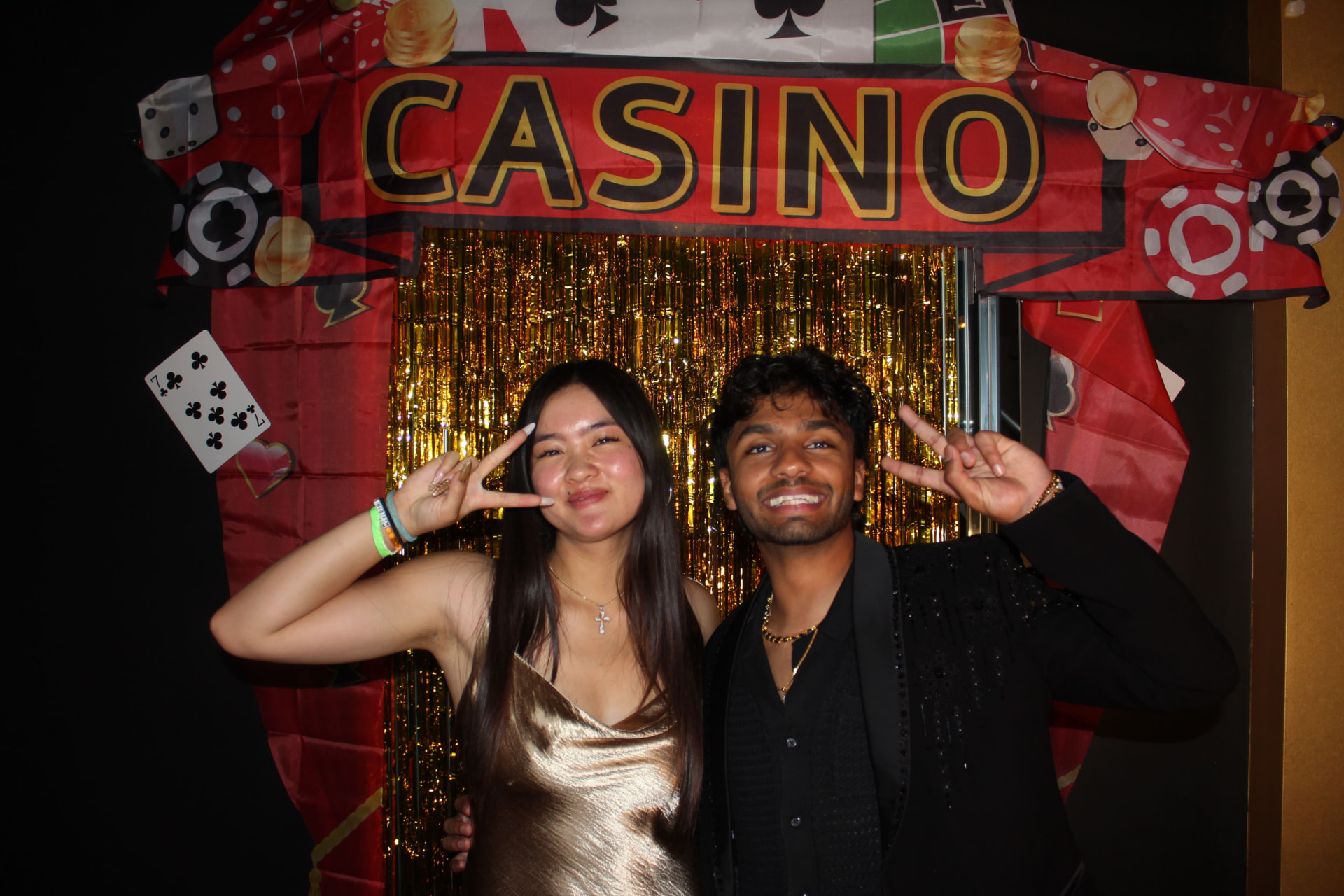 Two chapter members at a casino-themed social