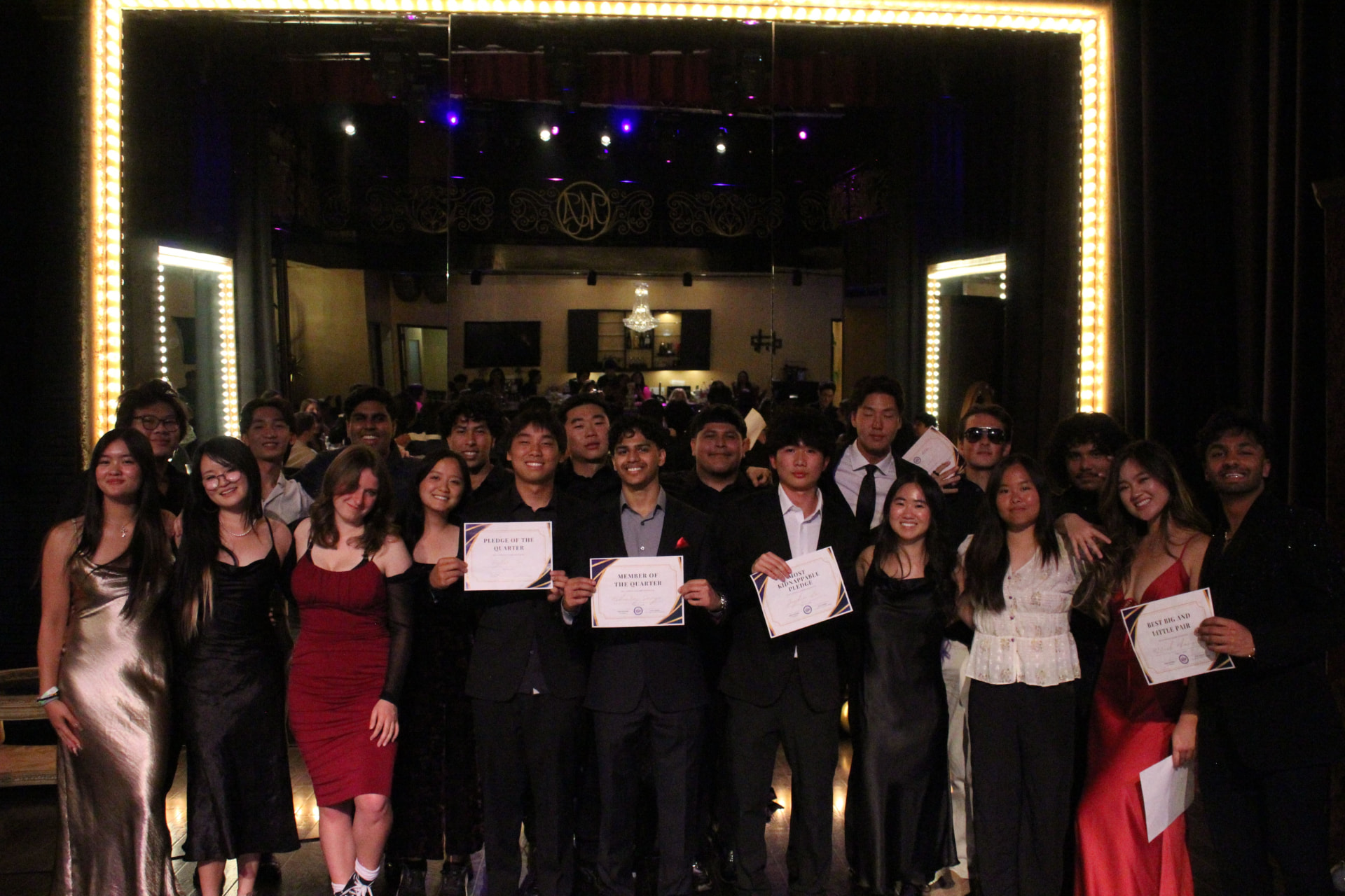 The chapter together at a formal celebration