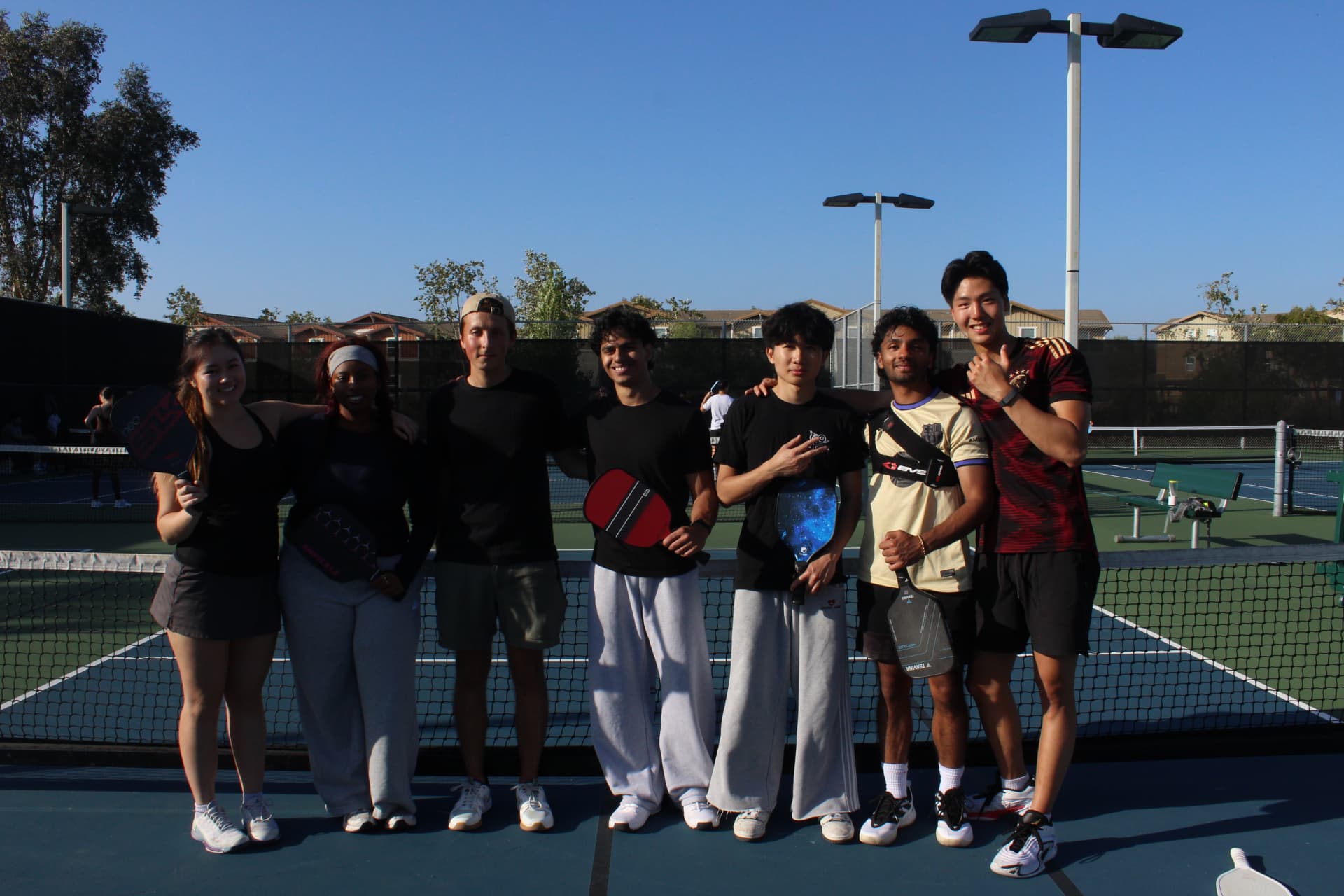 Chapter members together after playing pickleball