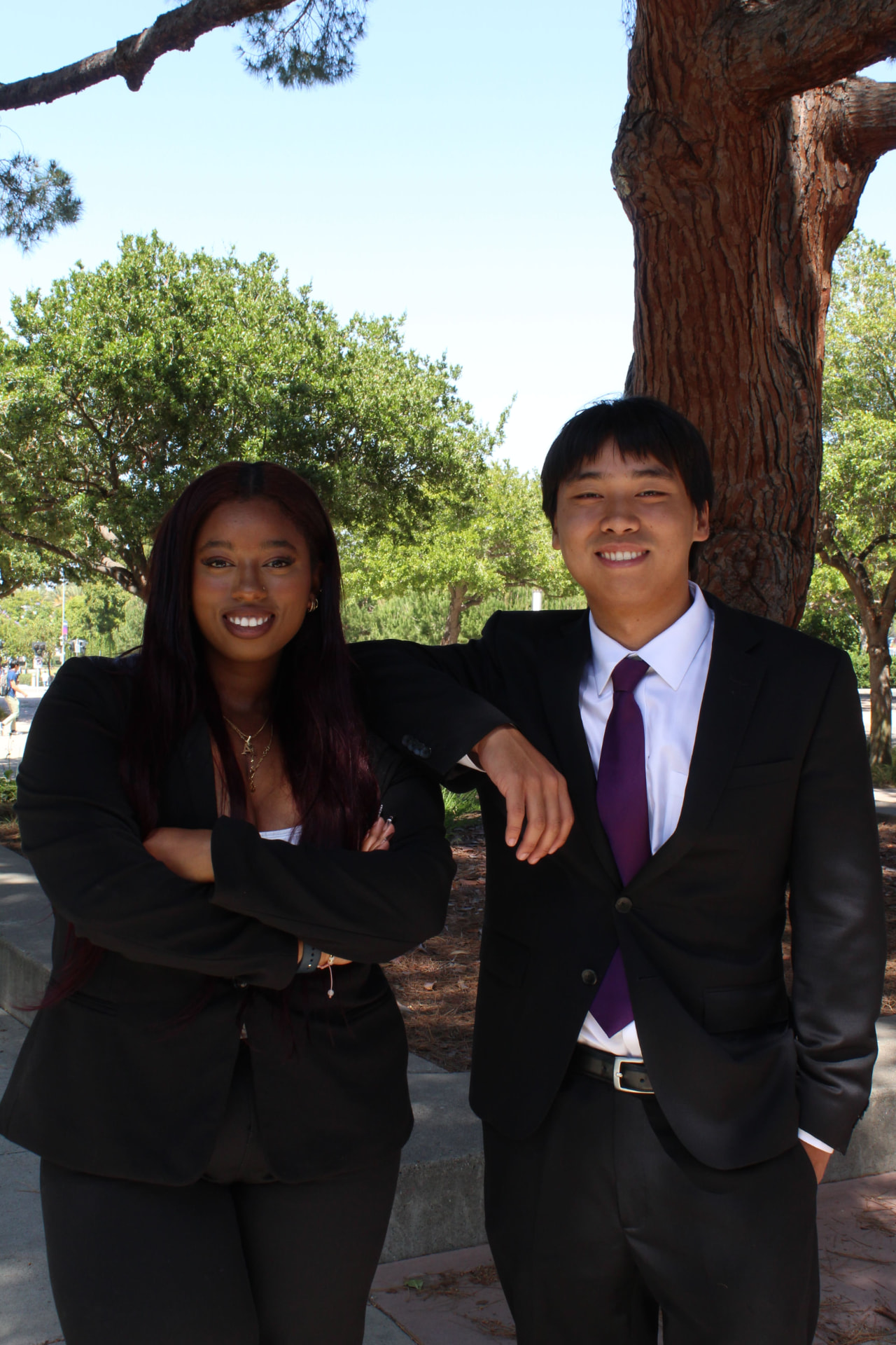 Two chapter members in professional attire