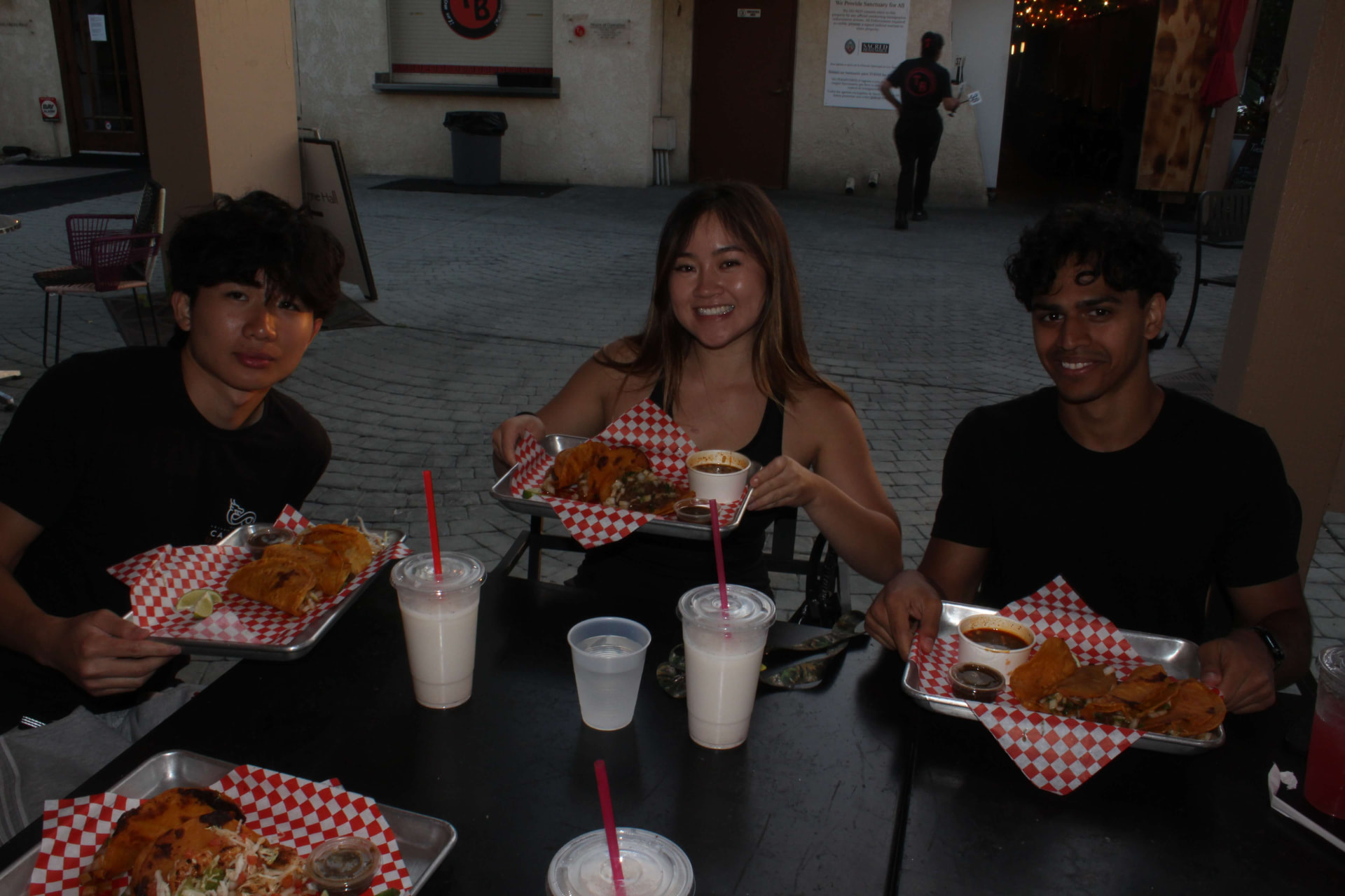 Three chapter members enjoying dinner together