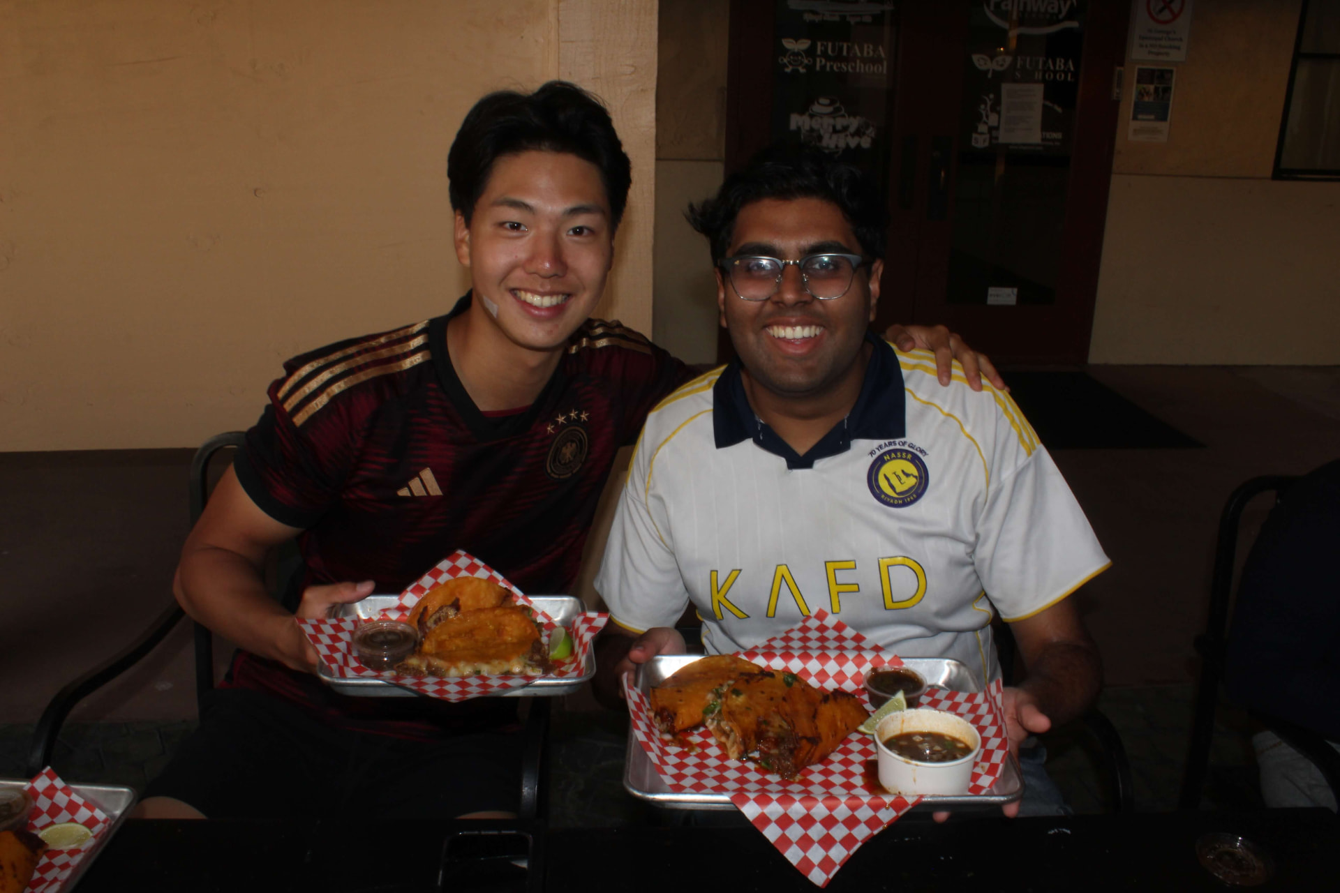 Two chapter members sharing a meal together